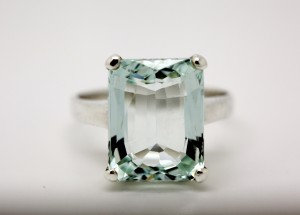 Natural aquamarine gemstone from Takeo province, set into a ring. Photograph taken 10 September 2015. ODC