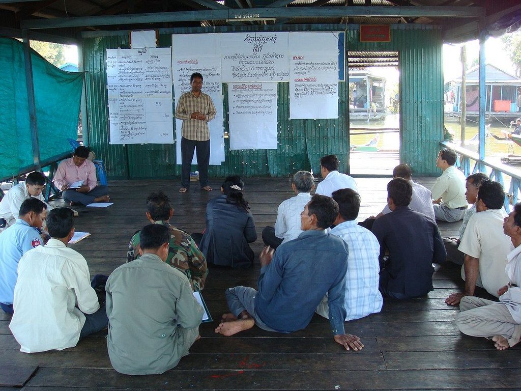 Mr Il Oeur, director of Analysing Development Issues Centre (ADIC), a domestic NGO and WorldFish partner in Cambodia, leads a local dialogue session.